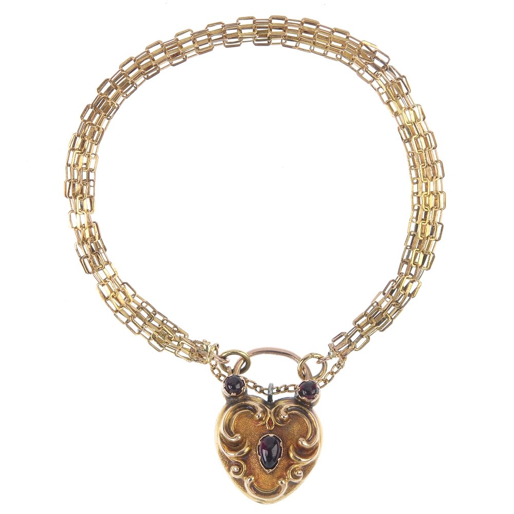 A garnet padlock and chain. The scrolling padlock with (1 of 3)