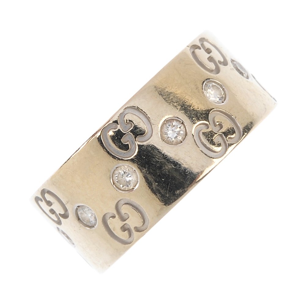GUCCI - an 'Icon' diamond band ring.  The wide band, (1 of 3)