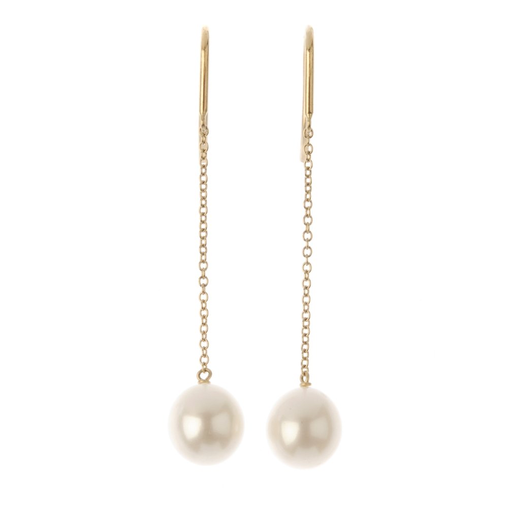 TIFFANY & CO. - a pair of 18ct gold cultured pearl ear: TIFFANY & CO. - a pair of 18ct gold cultured pearl ear pendants, by Elsa Peretti for Tiffany & Co. Each designed as a cultured pearl, suspended from a belcher-link chain. Signed T&Co Peretti. Hallmark