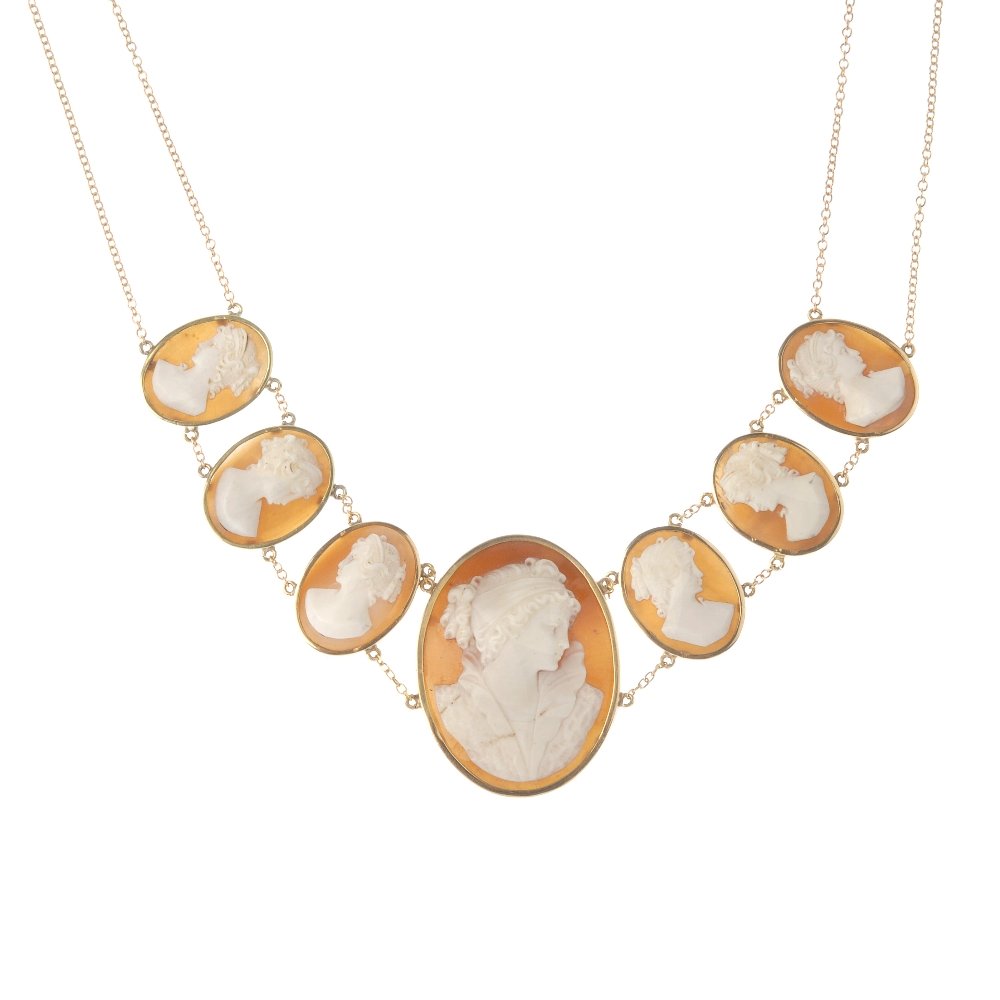 A shell cameo necklace. The oval-shape shell, carved to (1 of 3)