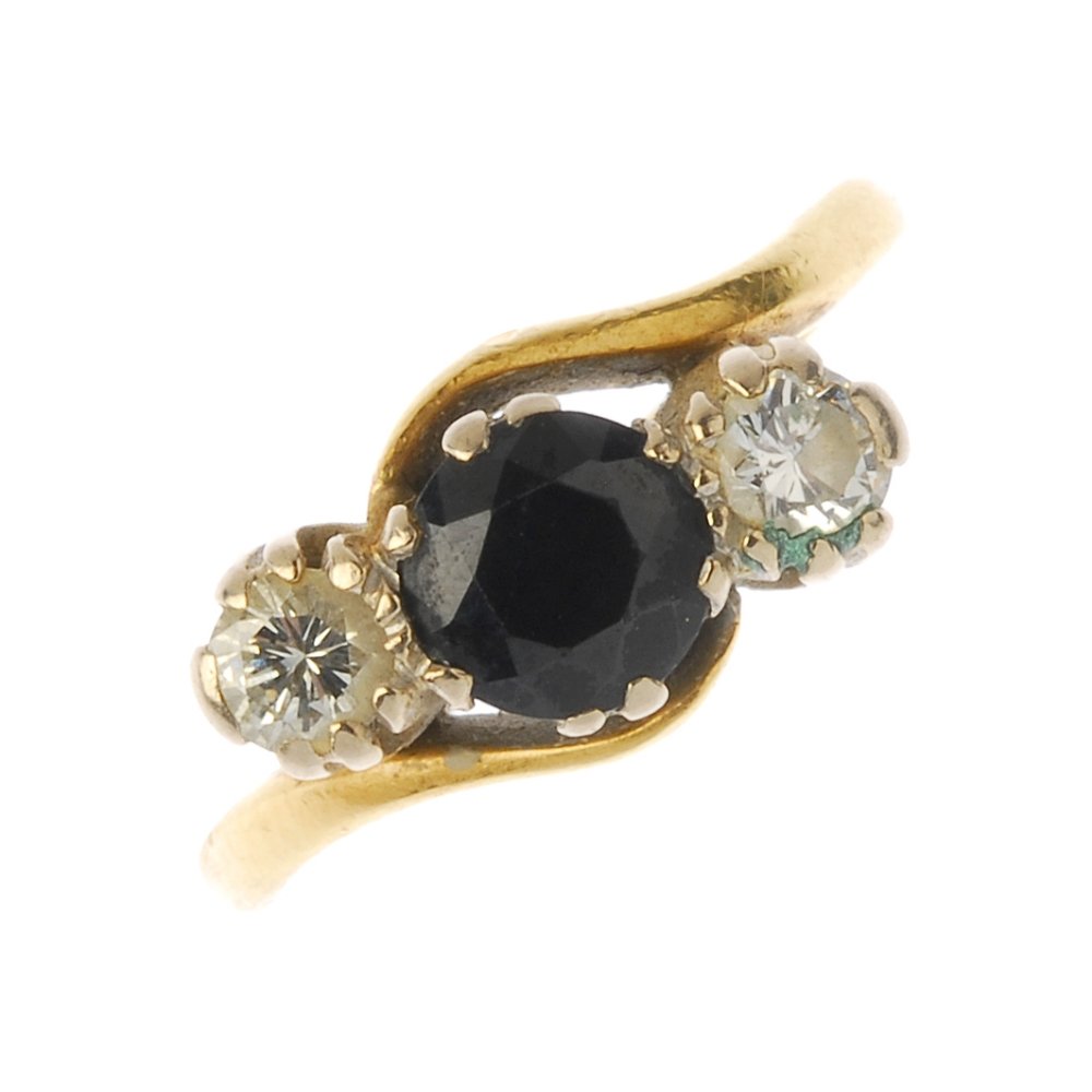 An 18ct gold sapphire and diamond three-stone crossover (1 of 3)