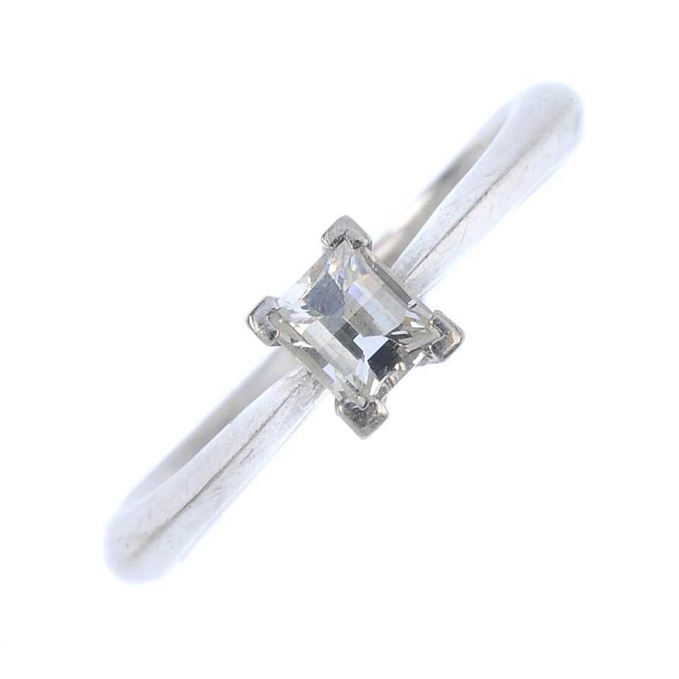 A platinum diamond single-stone ring. The (1 of 3)