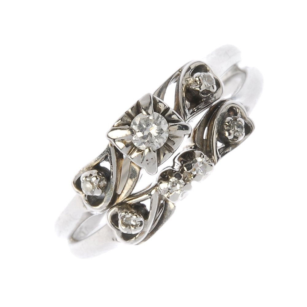 A diamond dress ring. Comprising two brilliant-cut (1 of 3)