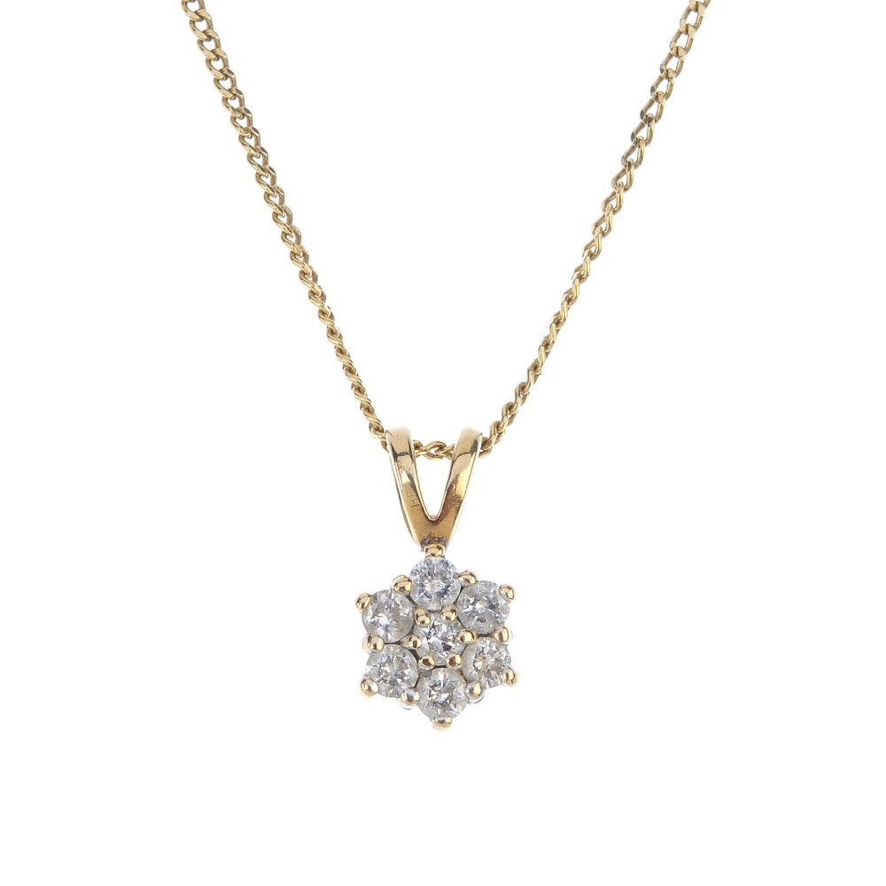 A diamond cluster pendant, with 18ct gold chain. The (1 of 3)