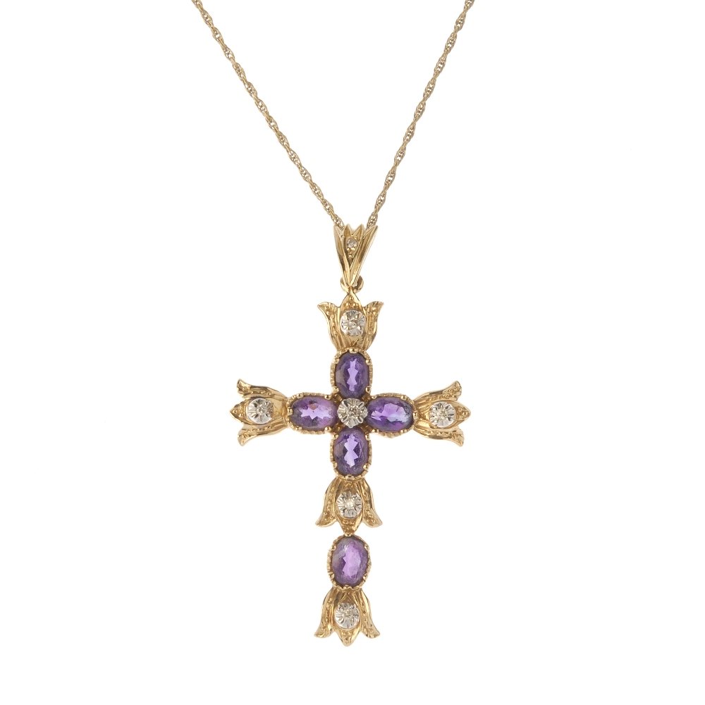 An amethyst cross pendant, with chain. The oval-shape (1 of 3)