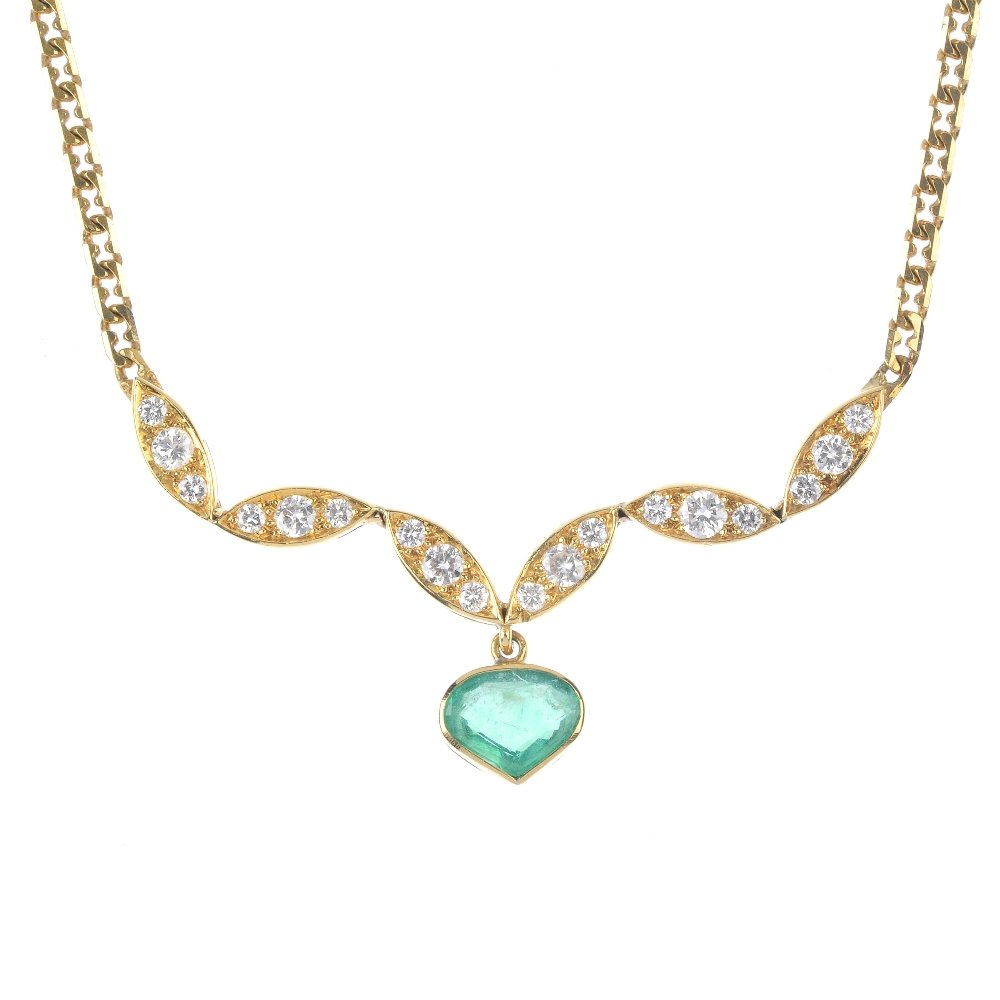 An 18ct gold emerald and diamond necklace. The (1 of 3)