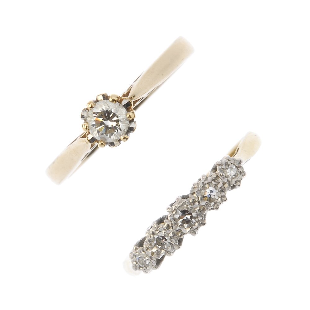 A platinum and 18ct gold diamond five-stone ring, (1 of 3)