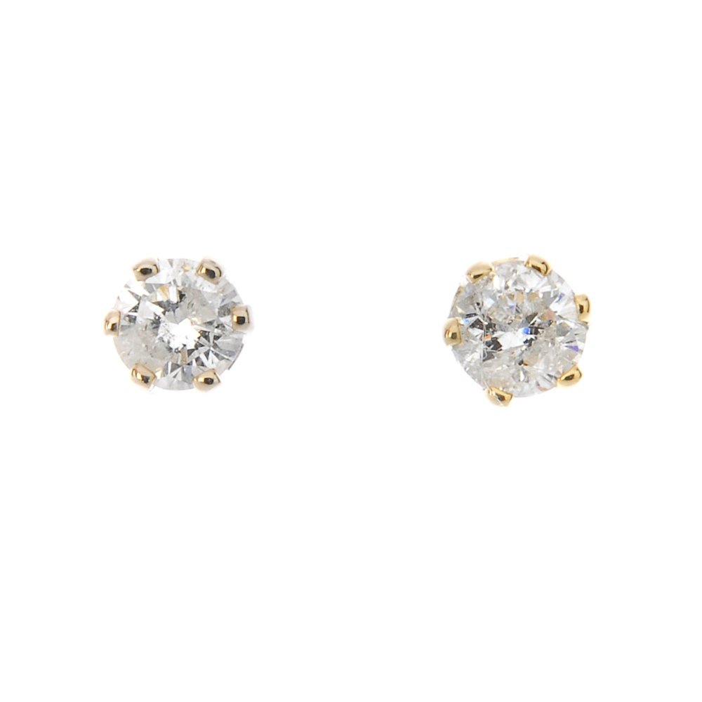 A pair of brilliant-cut diamond single-stone ear studs. (1 of 2)