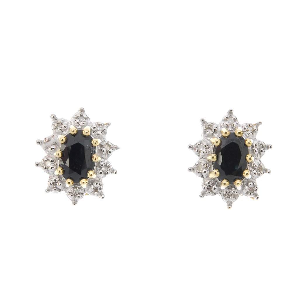 A pair of sapphire and diamond cluster ear studs. Each (1 of 2)