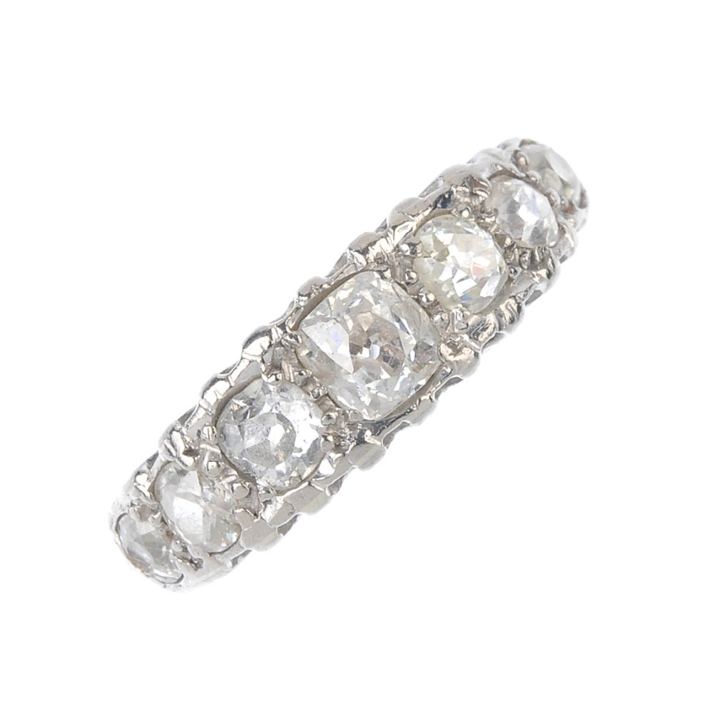 A diamond seven-stone ring. The graduated old-cut (1 of 3)