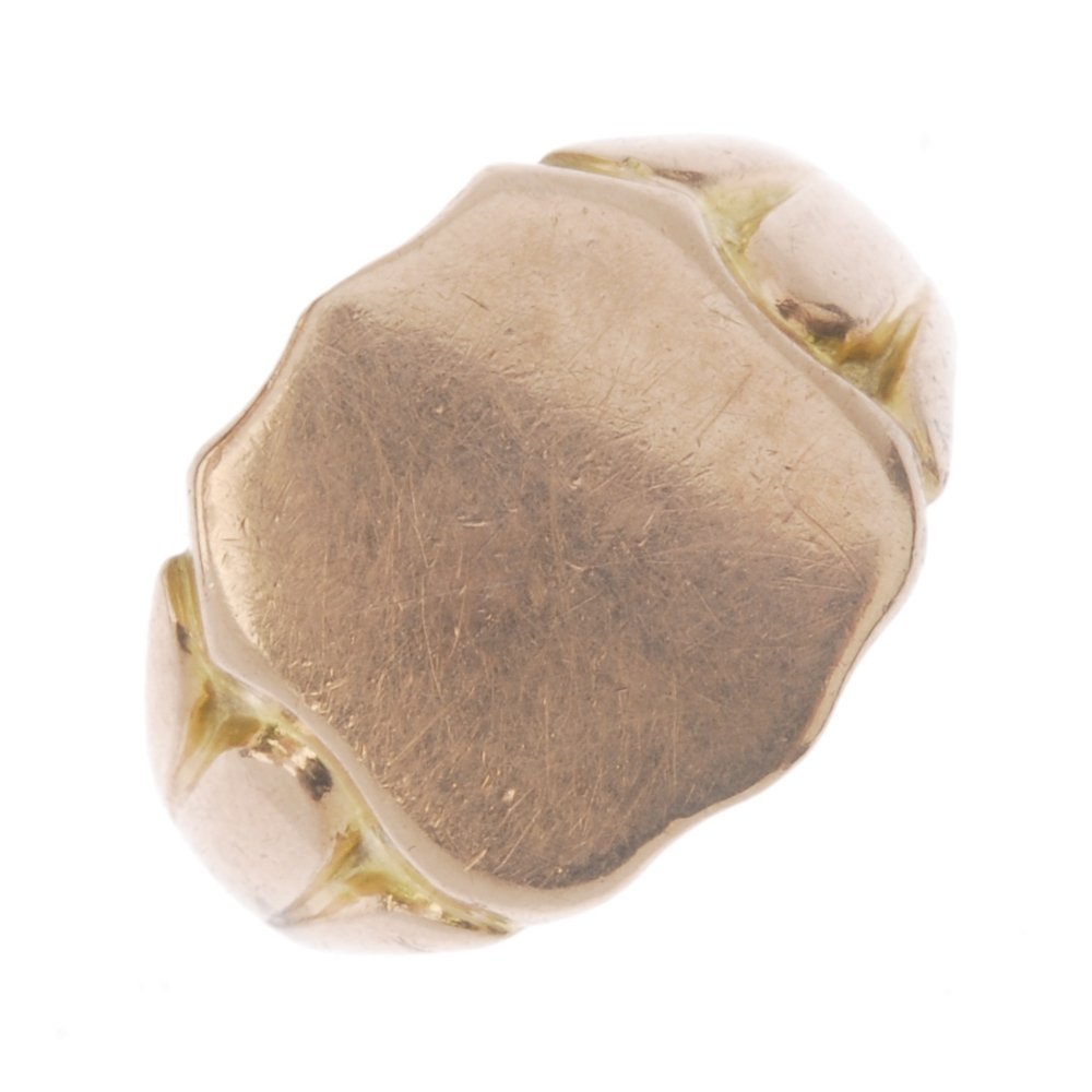 An early 20th century 9ct gold signet ring. The (1 of 3)
