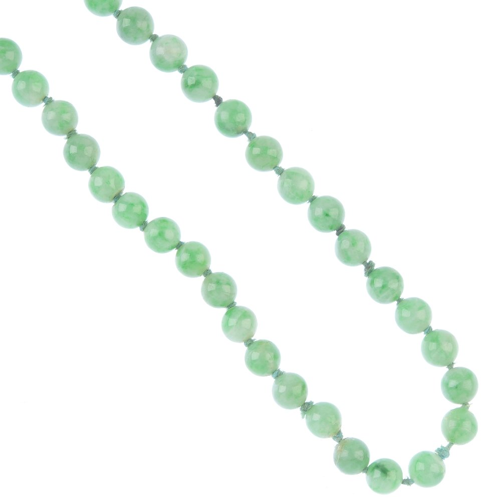 A jade single-strand necklace. Comprising a strand of (1 of 2)