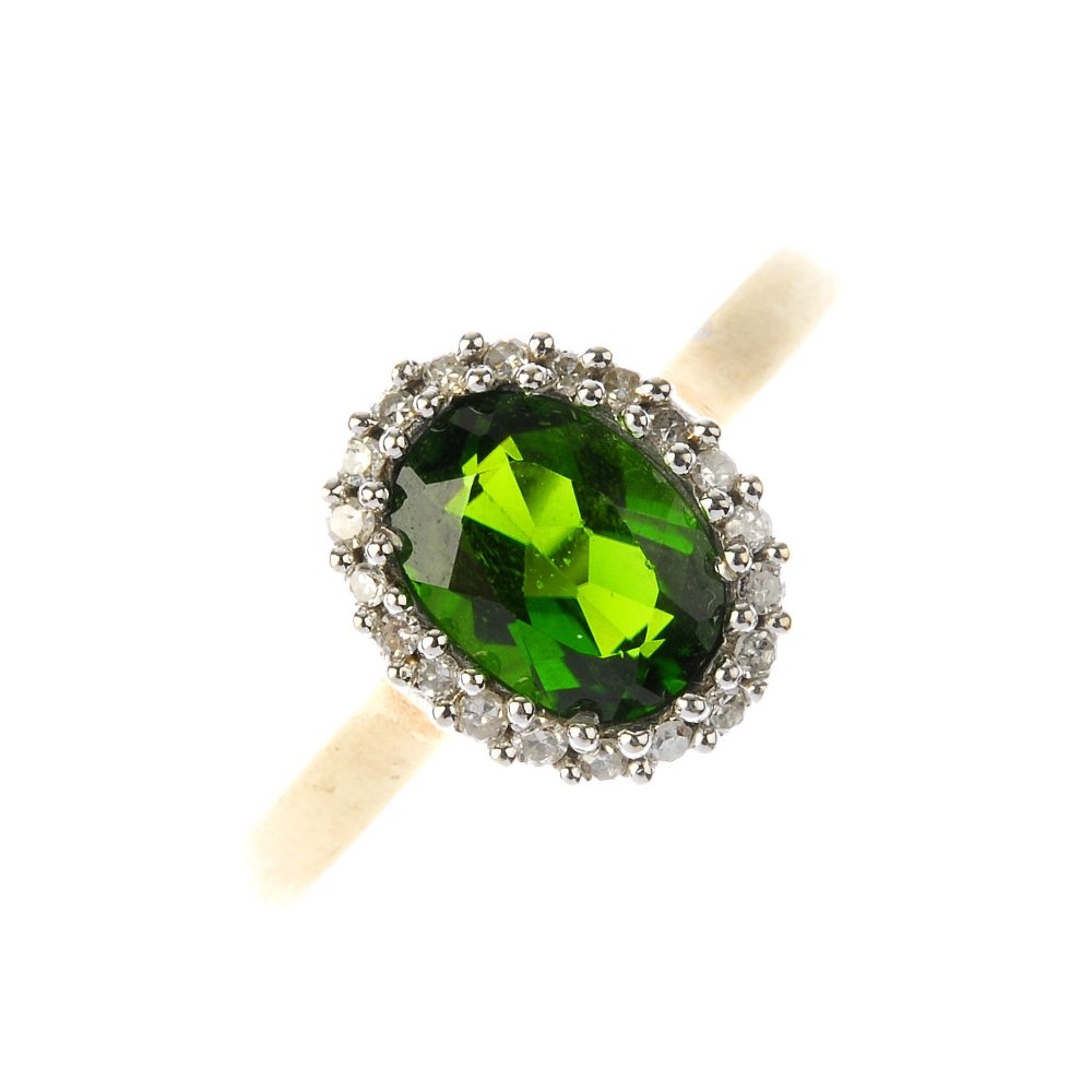 A diopside and diamond cluster ring. The oval-shape (1 of 3)