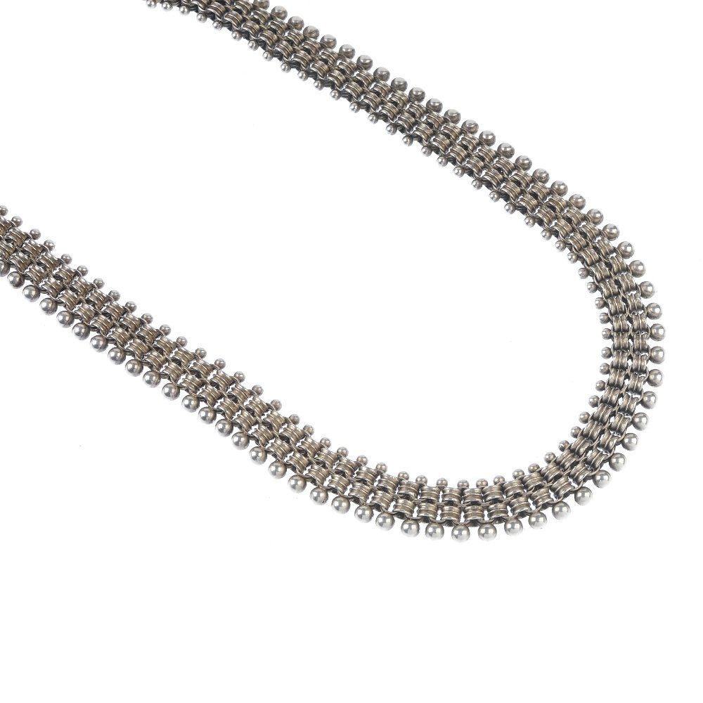 Two late 19th century silver necklaces. To include a (1 of 3)