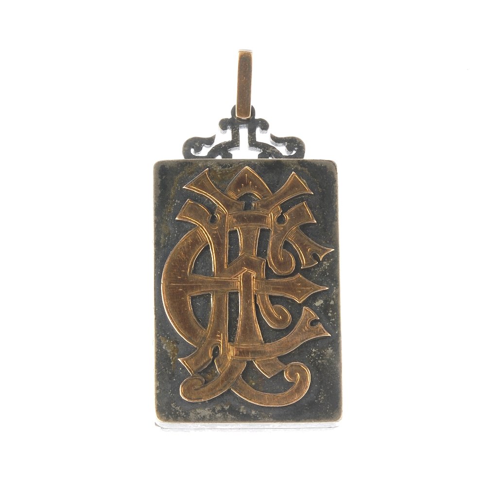 A late Victorian silver and gold locket. Of rectangular (1 of 3)