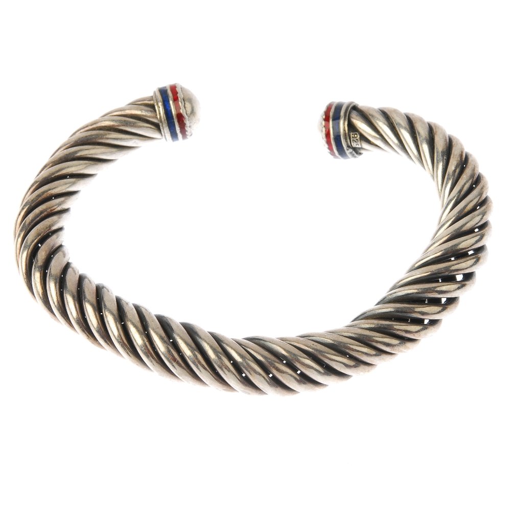 A selection of silver and white metal bangles. To (1 of 3)