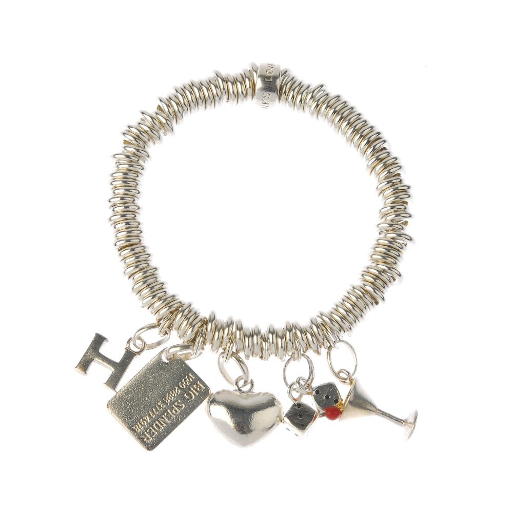 LINKS OF LONDON - two 'Sweetie' charm bracelets. The: LINKS OF LONDON - two 'Sweetie' charm bracelets. The two bracelets with a total of five Links of London charms, including martini glass and heart charms. Inner diameters 5.2cms. Weight 127.6gms. The c
