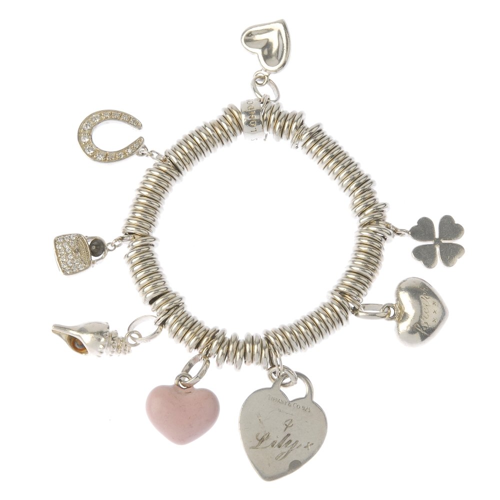 LINKS OF LONDON - three 'Sweetie' charm bracelets. The: LINKS OF LONDON - three 'Sweetie' charm bracelets. The three 'Sweetie' bracelets suspending a total of nine Links of London charms, including a hedgehog charm, three non-designer charms and a Tiffany