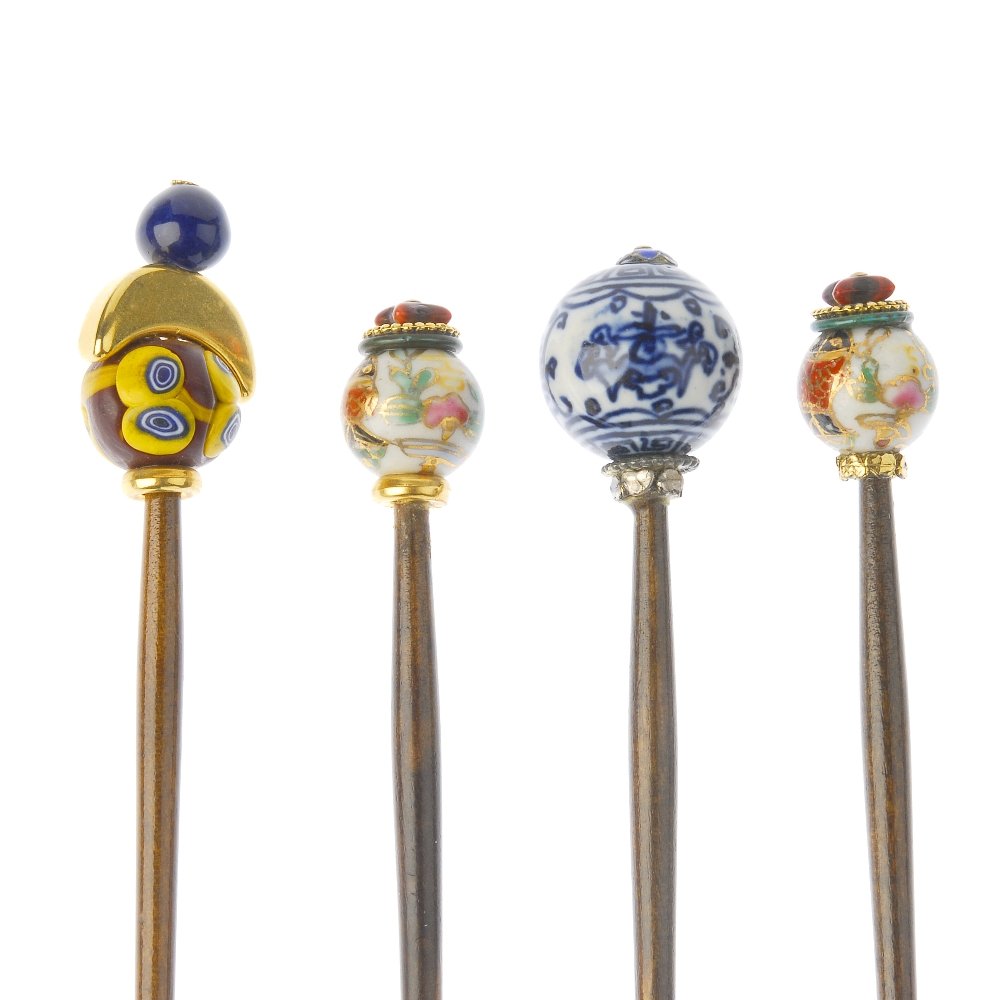 A selection of hair sticks. To include a number of (1 of 4)