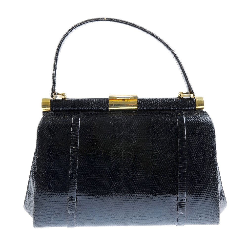 Three vintage handbags. To include a structured brown (1 of 3)