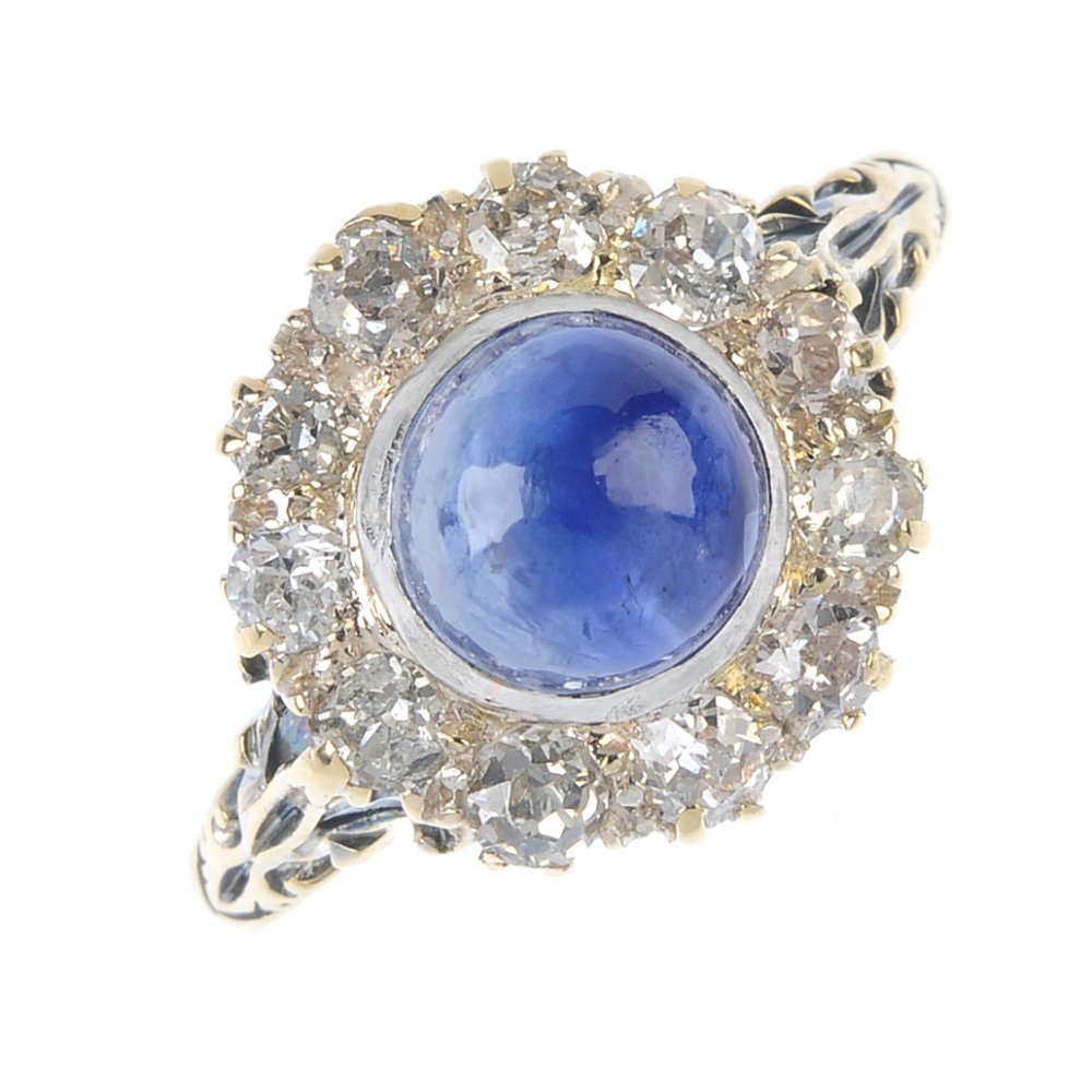 A sapphire and diamond cluster ring. The circular (1 of 3)