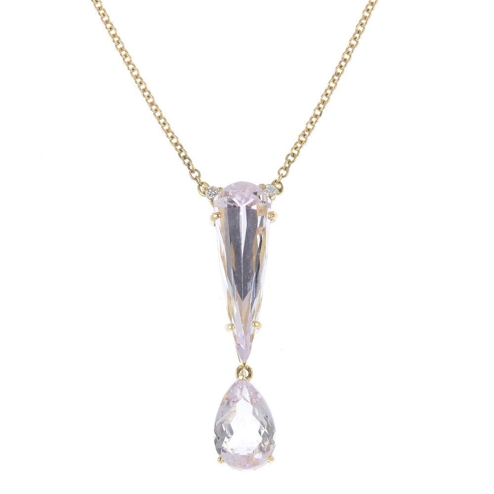 A kunzite and diamond pendant. The elongated pear-shape (1 of 2)