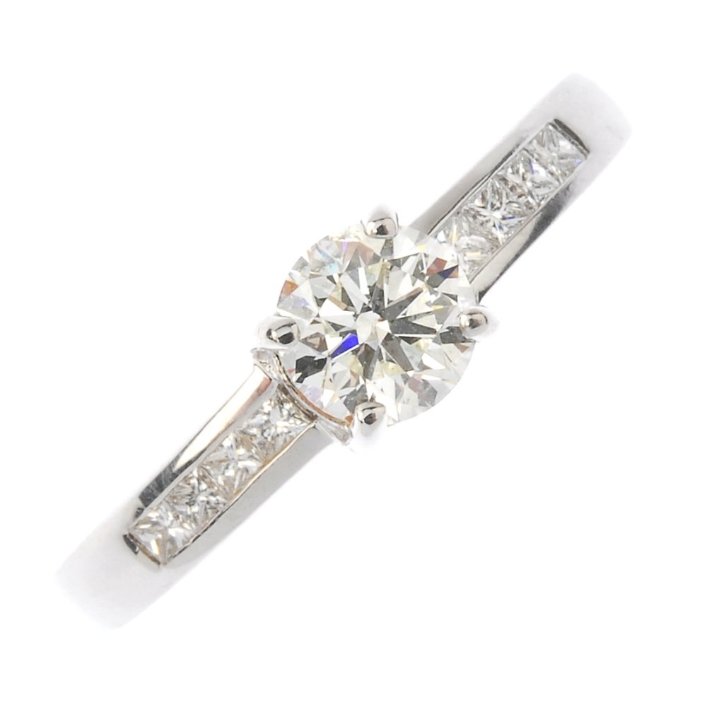 An 18ct gold diamond single-stone ring. The (1 of 3)