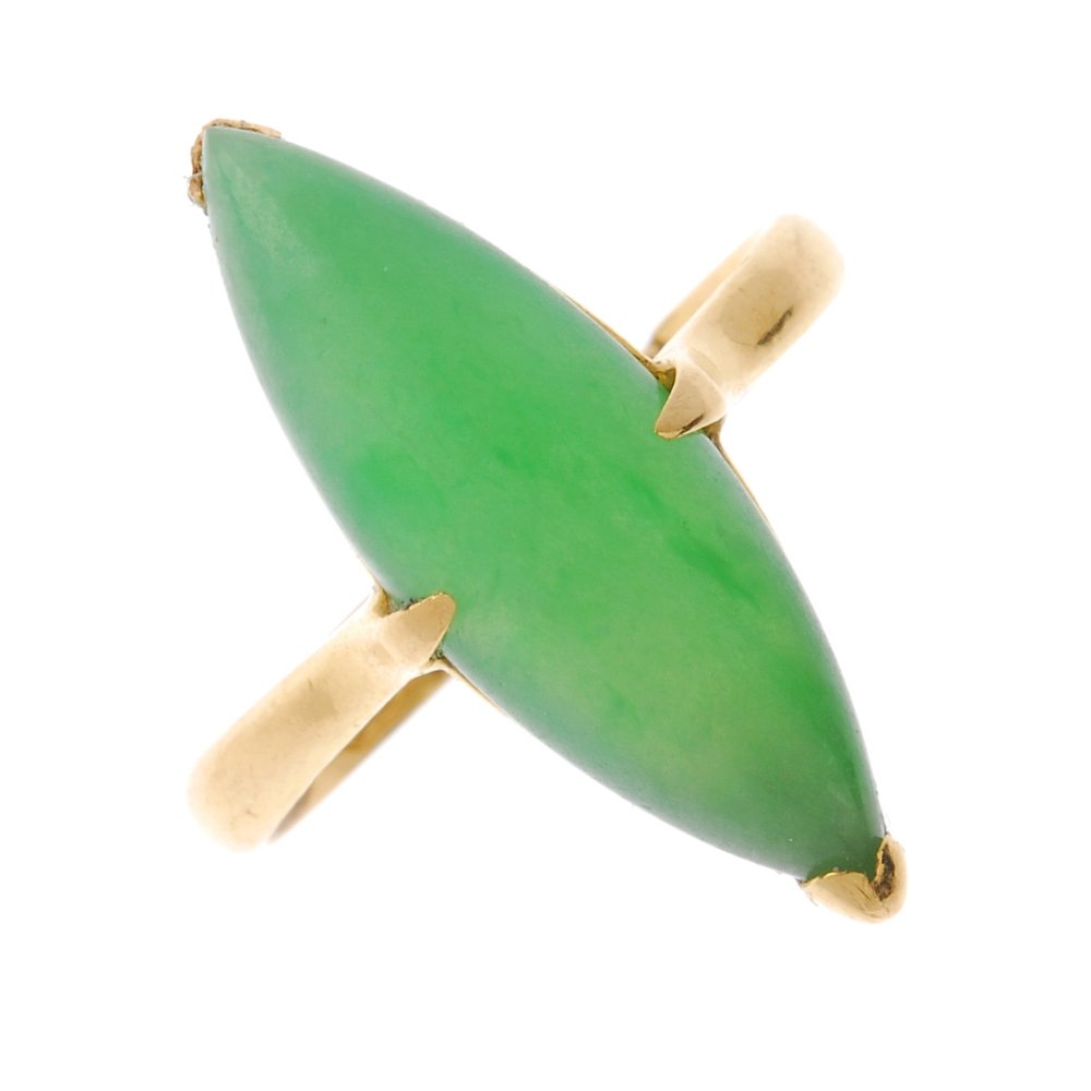 A mid 20th century gold jade single-stone ring. The (1 of 3)