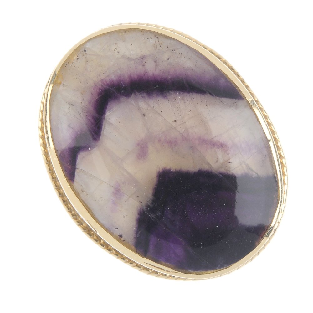 A 9ct gold blue john single-stone ring. The oval blue (1 of 3)