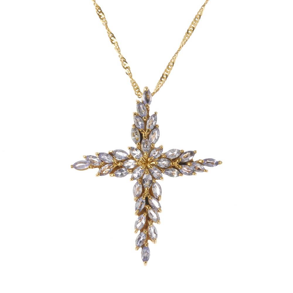 A 9ct gold tanzanite cross pendant, with chain. The (1 of 2)