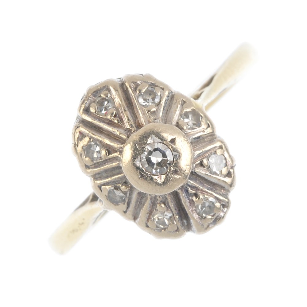 A mid 20th century 18ct gold diamond dress ring. Of (1 of 3)