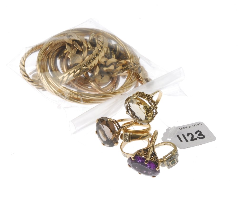 (18027) An assortment of jewellery. To include a 22ct: (18027) An assortment of jewellery. To include a 22ct gold plain band ring, six stone-set rings, a cross pendant, three pairs of hoop earrings, two odd earrings, two curb-link bracelets and a flat cur