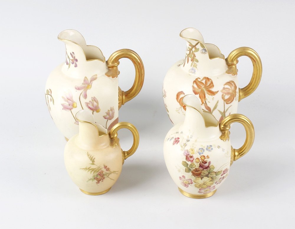 Four Royal Worcester porcelain flatback jugs,: Four Royal Worcester porcelain flatback jugs, comprising a pair plus two smaller, each decorated with flowers upon a cream or blush ivory ground, each marked and numbered beneath, largest 6.5, (16.5cm
