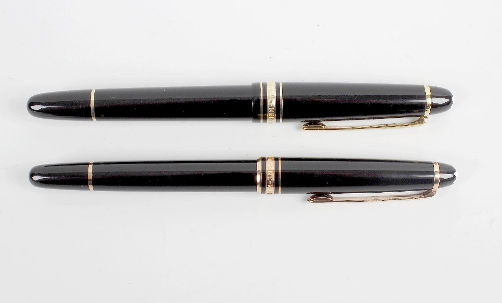 A Montblanc Meisterstuck Pix fountain pen, having 18K: A Montblanc Meisterstuck Pix fountain pen, having 18K '4810' Montblanc nib, with black resin body, gold coloured clip and banding, the domed terminal with white star emblem, together with a Montblanc 