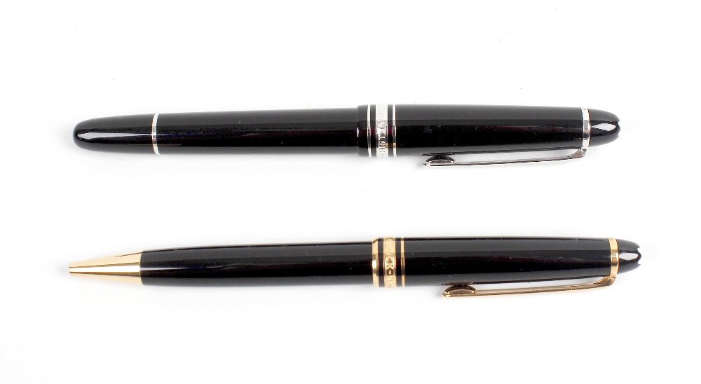 A Montblanc Meisterstuck fountain pen, having 14K: A Montblanc Meisterstuck fountain pen, having 14K '4810' Montblanc nib, with black resin body, silvered clip and banding, the domed terminal with white star emblem, together with a Montblanc Meisterst