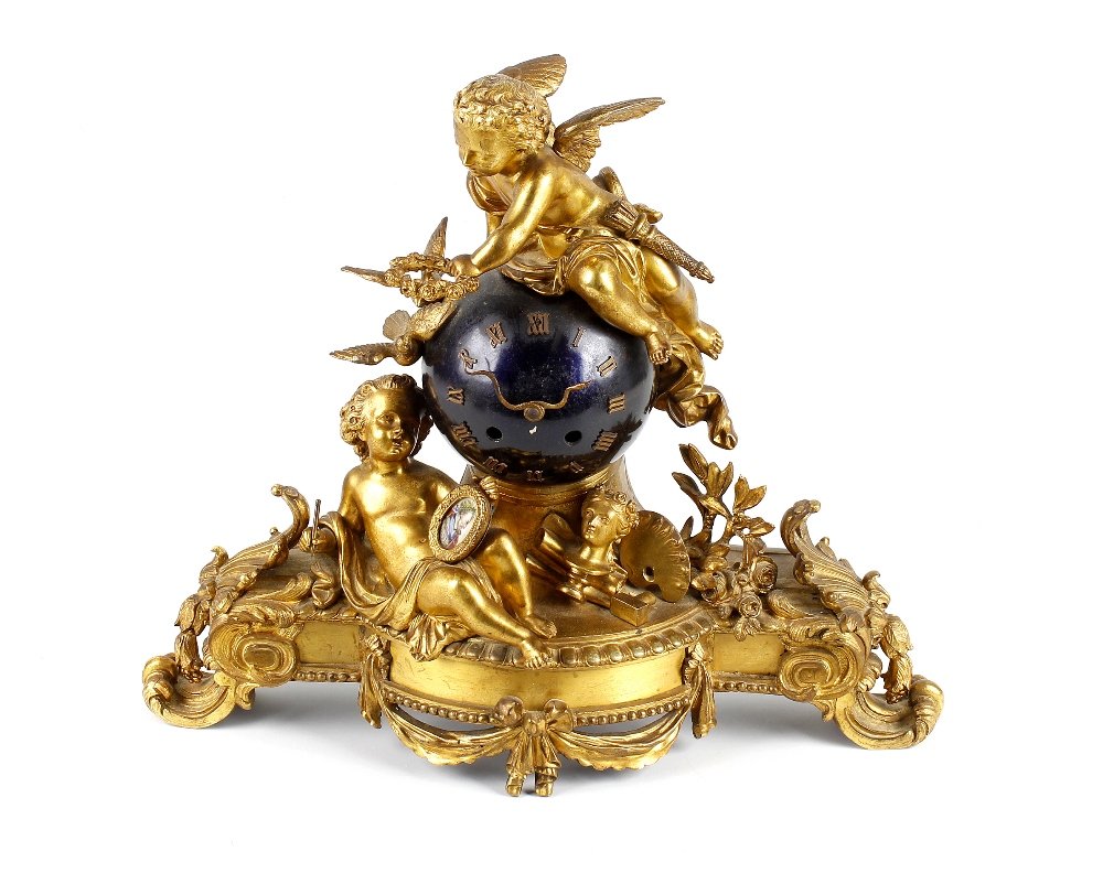A good mid 19th century French ormolu mantel clock,: A good mid 19th century French ormolu mantel clock, having Roman numerals and serpent hands to the integral spherical dial enclosing the two-train movement, outside countwheel-striking on a bell, stam