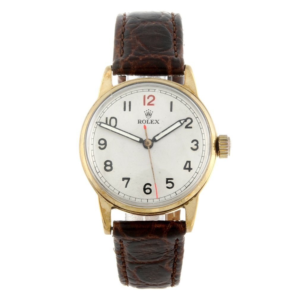 ROLEX - a gentleman's wrist watch. 9ct yellow gold (1 of 4)
