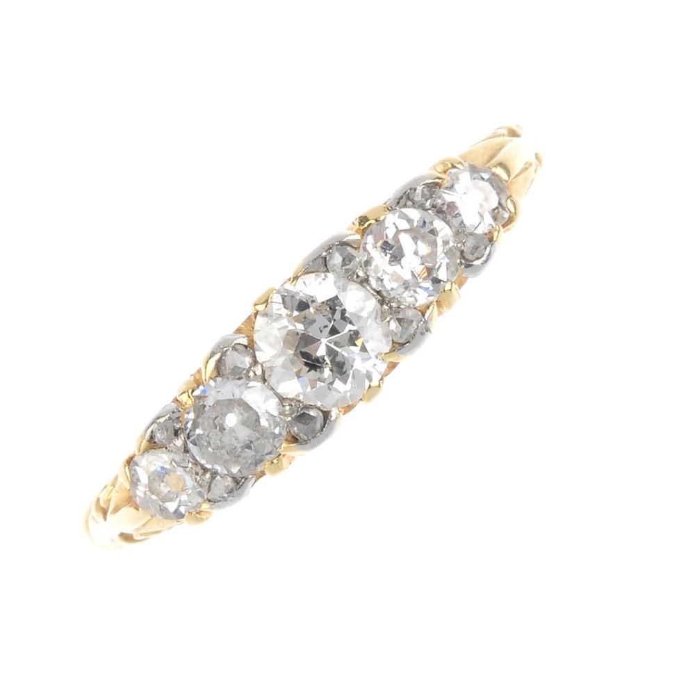 A mid 20th century 18ct gold diamond five-stone ring. (1 of 3)