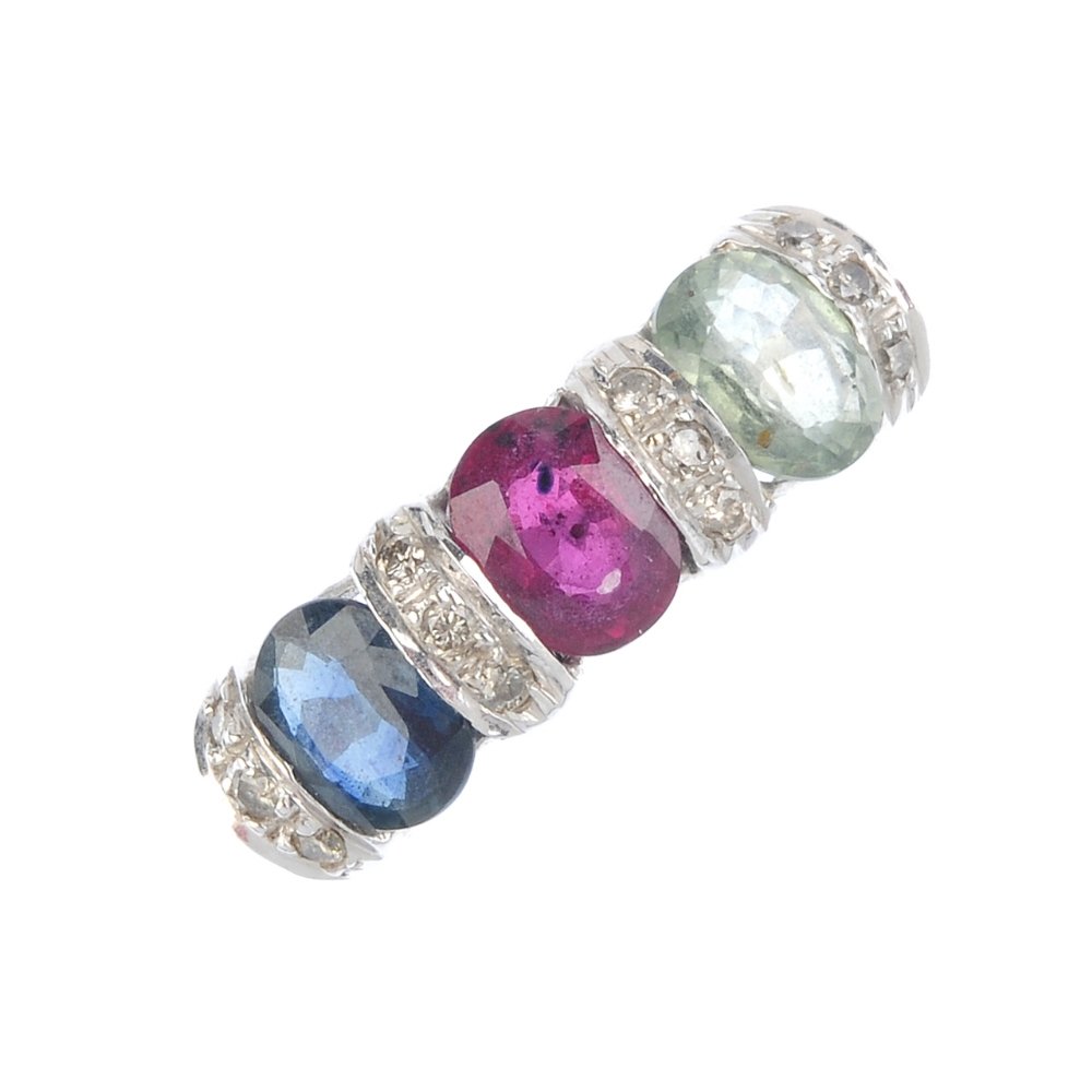 A multi-gem and diamond dress ring. Comprising an (1 of 3)