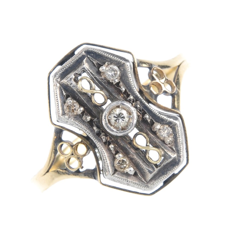 A diamond dress ring. Of openwork design, the (1 of 3)