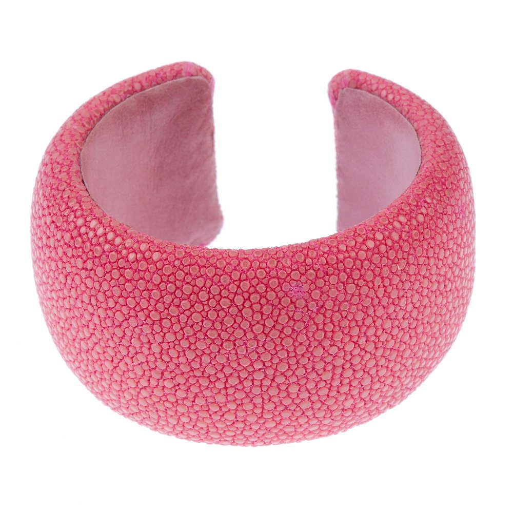 A dyed pink stingray cuff. The open cuff lined with (1 of 2)
