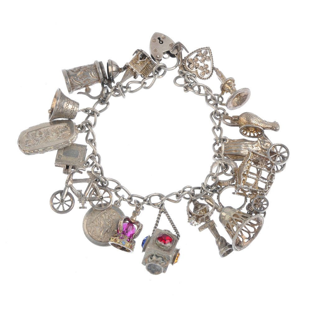 Two charm bracelets. The curb-link bracelets suspending (1 of 2)