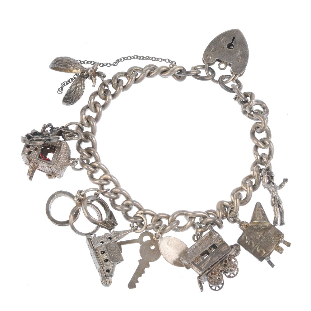 Three charm bracelets. The curb-link chains suspending (1 of 2)