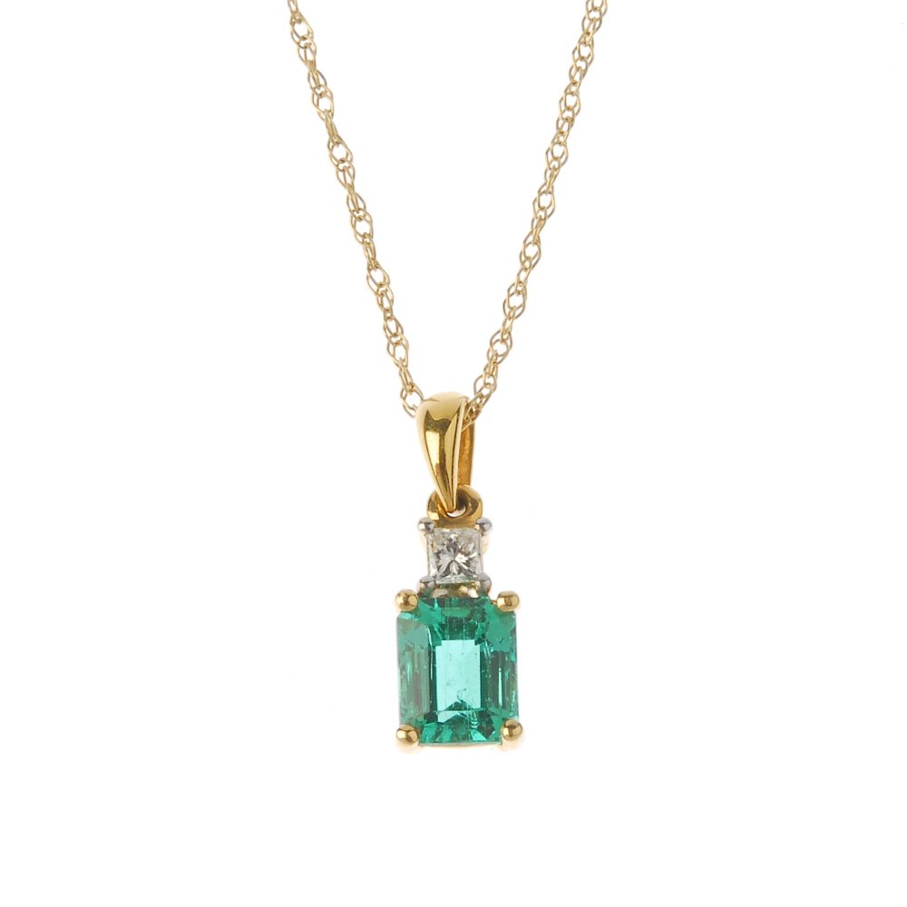 An 18ct gold emerald and diamond pendant. The (1 of 1)