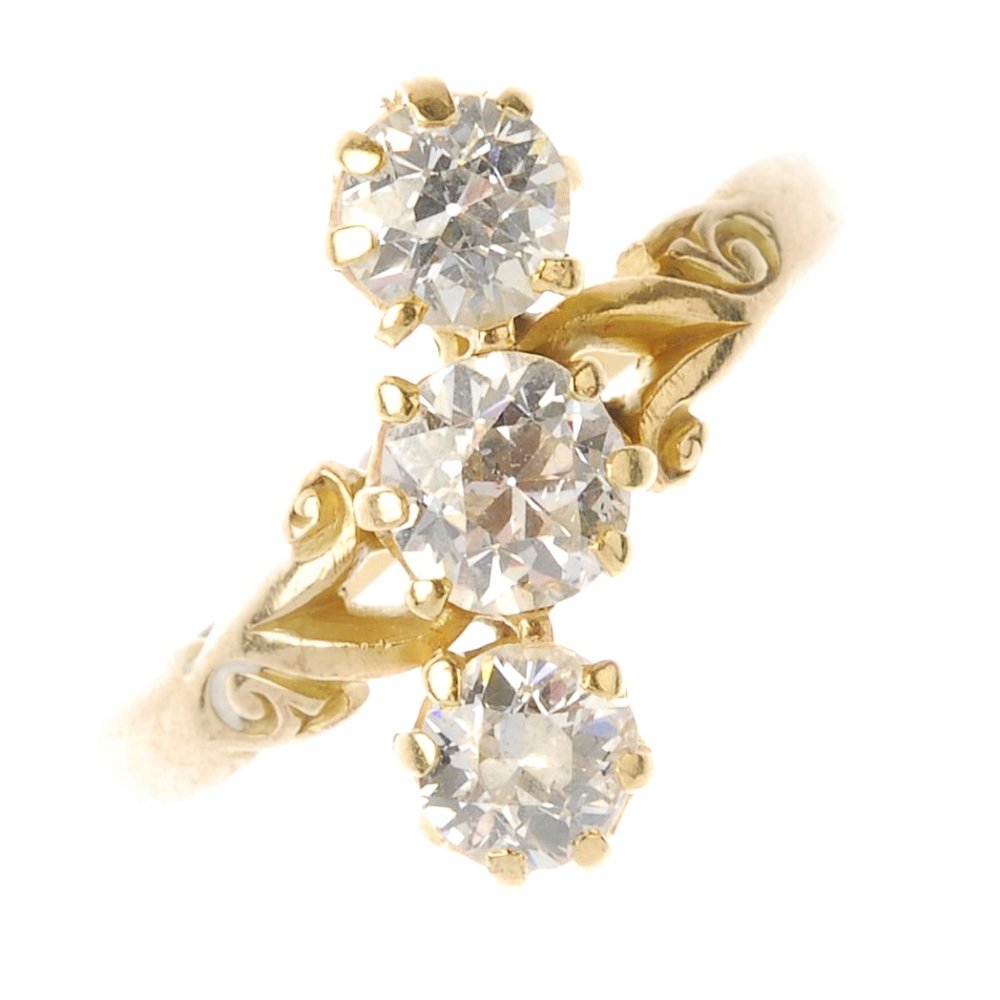 A diamond three-stone ring. Designed as a diagonal line (1 of 4)