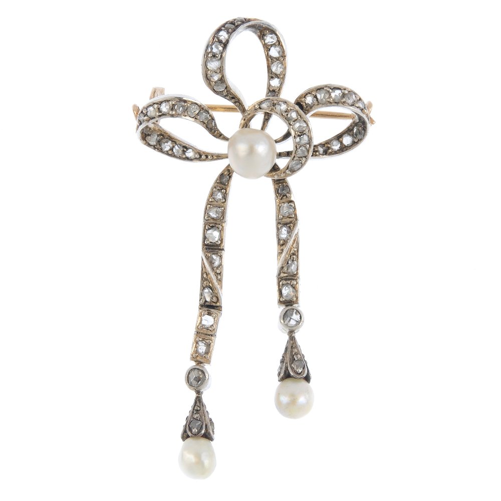 An early 20th century silver and gold pearl and diamond (1 of 2)