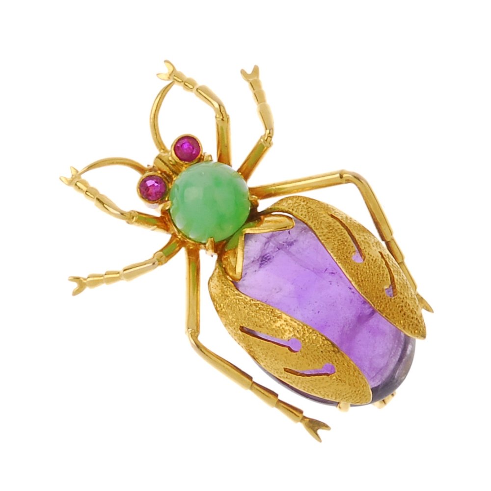 A gem-set fly brooch. The oval amethyst cabochon body, (1 of 2)