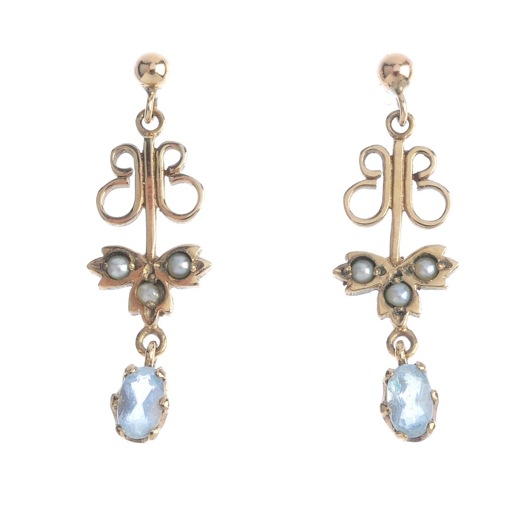 A pair of 9ct gold aquamarine and split pearl earrings. (1 of 2)