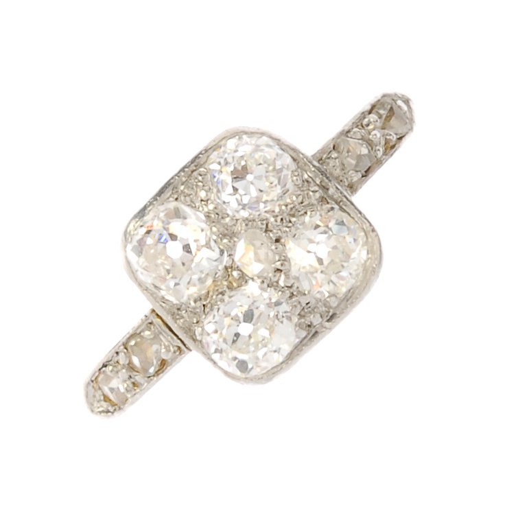 An early 20th century 18ct gold diamond dress ring. The (1 of 3)