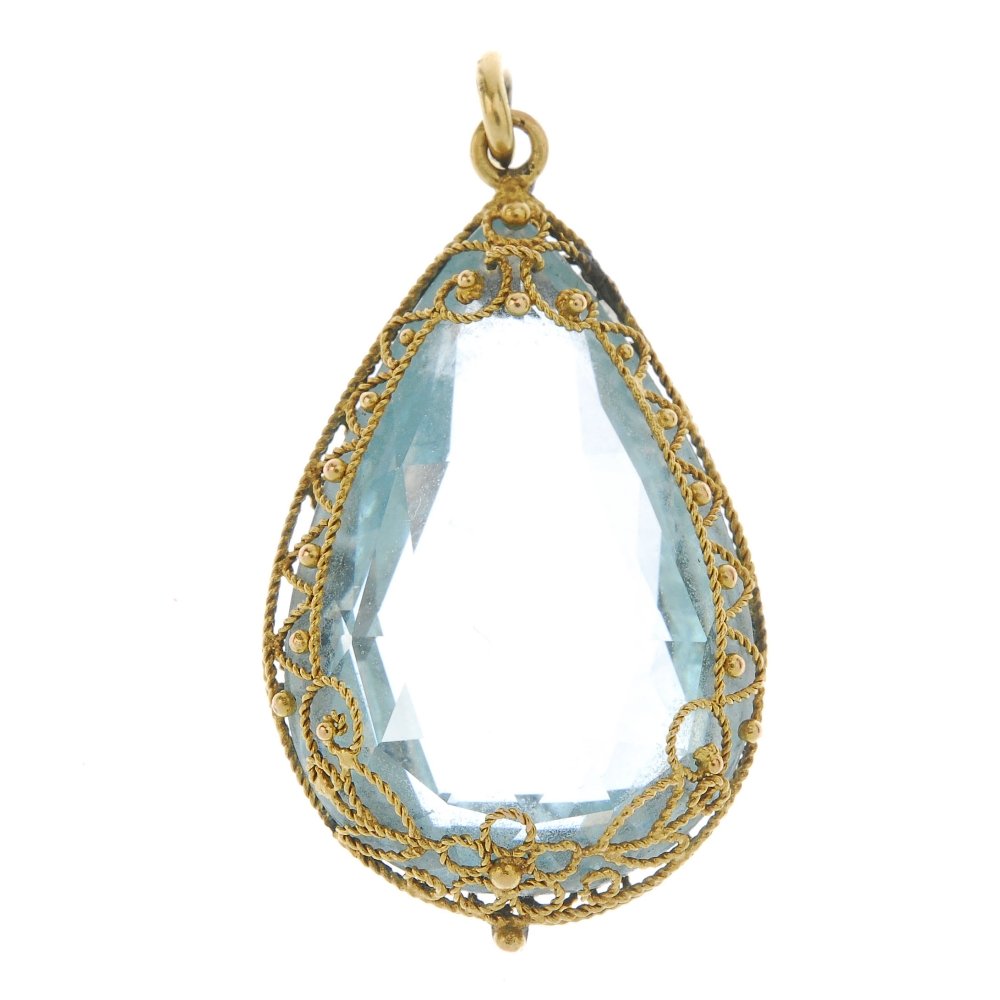 A topaz pendant. The blue topaz, encased within a (1 of 2)